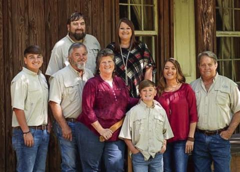 Back row: Eric &amp; Amy Thompson; steps: Earl &amp; Beth; ground: Jacob and Jaden Thompson (grandsons); and Amber and Mark Roberts. (Photo by Laura Dixon Photography)