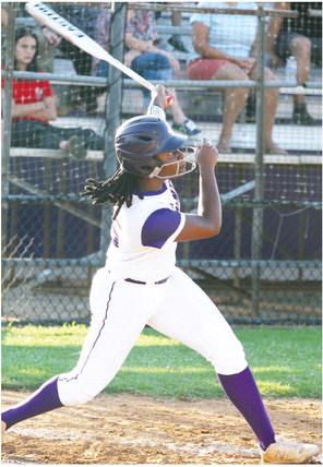 Tranasia Parker blasts a homer over the fence during the Lady Hounds’ ten-run fourth inning. BRAD HARRISON/Staff