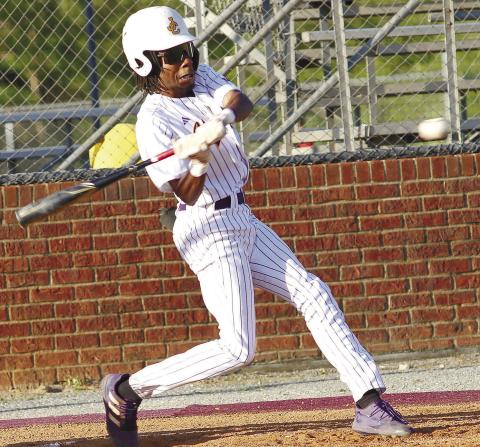 Marlin Mills and the Greyhounds blew Monday’s game open with a six-run third inning. BRAD HARRISON/Staff