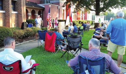 A crowd gathered at the Jones County Courthouse as the Bible reading marathon took place last year. CONTRIBUTED