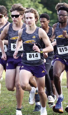 Having run together since their sixth-grade year, the Greyhounds’ seniors have goals of finishing out their careers at the top of the leaderboard. BRAD HARRISON/Staff