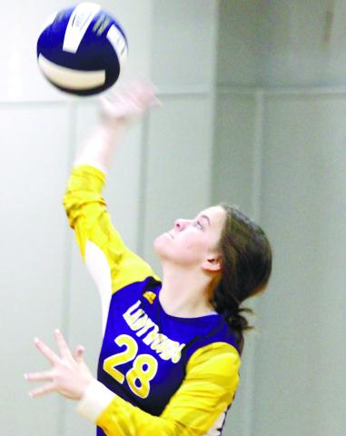 Jade Hipps serves the ball up on Thursday at Stratford. BRAD HARRISON/Staff