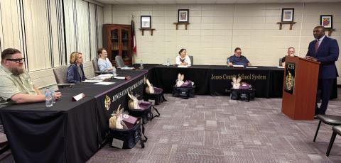 Dennis Woolfolk expresses his appreciation to the Board of Education after the announcement of his appointment as Assistant Superintendent of Operations and Efficiency at the March 10 meeting. CONTRIBUTED