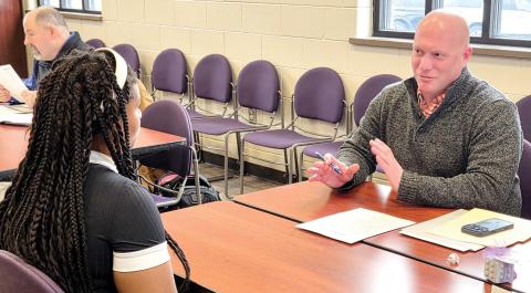 Bryan Hutchinson of First Environmental interviews a student at Jones County High School. CONTRIBUTED