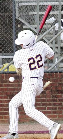 Kaylob Harris tries to avoid being hit by a pitch during the Greyhounds’ 22-run first inning on Monday against Howard. BRAD HARRISON/Staff