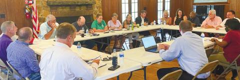 Mayor and council members from the City of Gray and Jones County Commissioners discuss the LOST split at the Lake Jonesco Clubhouse. DEBBIE LURIE-SMITH/Staff