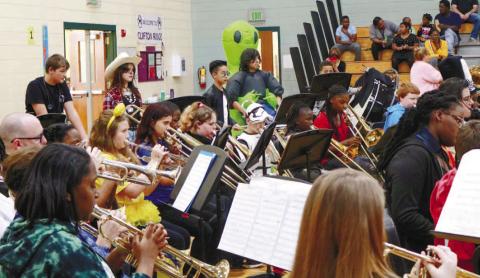 Band students in various Halloween costumes for their Fall Into the Arts performance. NATHAN CLARKE/Contributed