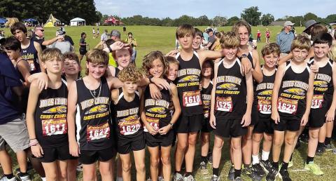 Middle school girls triumph at Bulldog Invitational, boys take third