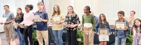 Jones County Young Author award recipients who range from kindergarten students to seniors are recognized at the March 11 Board meeting. DEBBIE LURIE-SMITH/Staff