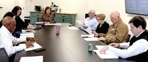 Gray DDA members welcomed new member,attorney Alex Smith (far right),at their Jan. 12 board meeting. DEBBIE LURIE-SMITH/Staff