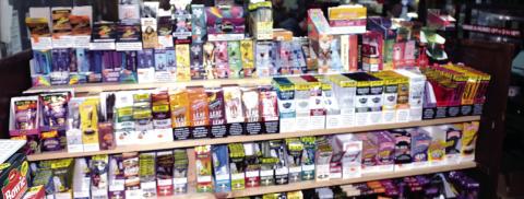 The popularity of CBD and vaping products (above) is evident in many Jones County convenience stores, with racks and racks of a variety of products. The investigator’s offices at the Jones County Sheriff’s Office were filled with seized items from stores found in violation (below), including all cash on the premises. CONTRIBUTED