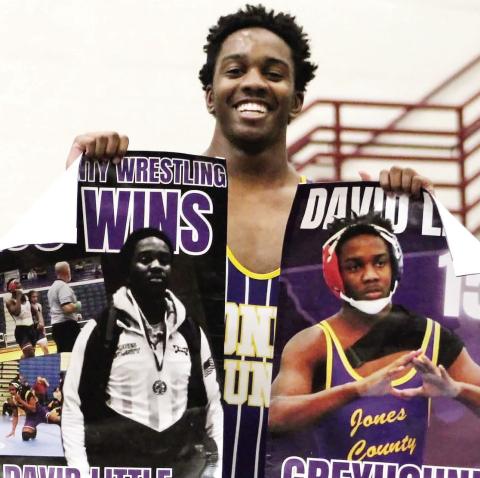 Little wins 100th match