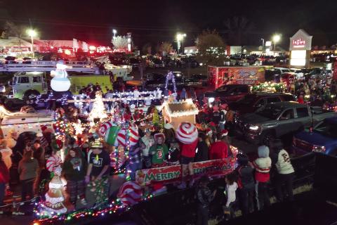 Floats line up in the Ingles parking lot for the 2023 Christmas Parade. Ingles is being honored this year by having its managers serve as grand marshals. FILE PHOTO