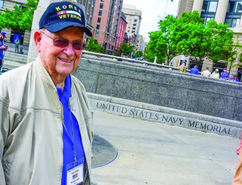 Veteran Ted Stone at the US Navy Memorial, the last memorial the Middle Georgia Honor Flight Group visited during their April 25 Washington D.C. tour. CONTRIBUTED