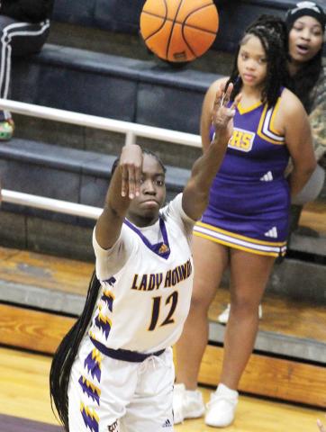 Mya Anderson pulls up to knock down a three pointer against Eagles Landing. BRAD HARRISON/Staff