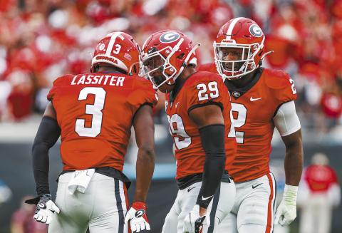Georgia defensive back Kamari Lassiter (3) and Georgia defensive back Christopher Smith (29) during Georgia’s game against Florida at TIAA Bank Field in Jacksonville in 2022. TONY WALSH/UGA Athletics