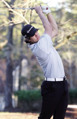 Cash Bearden drives his tee shot during last week’s match against ACE at River North Country Club. BRAD HARRISON/Staff