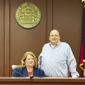 Ocmulgee Court Appointed Special Advocates (CASA) recently swore in new volunteer Arlin Brown, pictured with Juvenile Court Judge Kelli Rutherford. Brown will serve as a voice for children in foster care in the Ocmulgee Judicial Circuit, which covers Baldwin, Greene, Hancock, Jasper, Jones, Morgan, Putnam and Wilkinson counties.