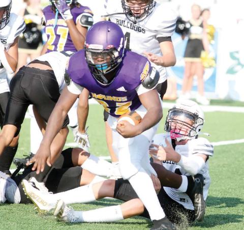 Middle school football splits with Monroe County