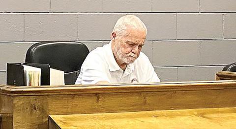 Mayor Ed Barbee navigated the step to sit behind the elevated bench in the D.V. Childs Civic Center for the June 3 Council Meeting. DEBBIE LURIE-SMITH/Staff