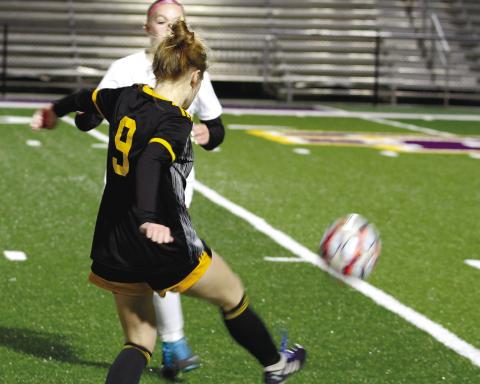 Emily Patat pivots the ball upfield during last Thursday’s scrimmage against Veterans. BRAD HARRISON/Staff