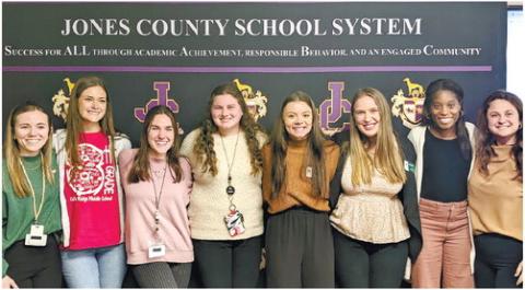 Georgia College and State University student teachers following their presentation to Board of Education members at their March 14 meeting. DEBBIE LURIE-SMITH/Staff
