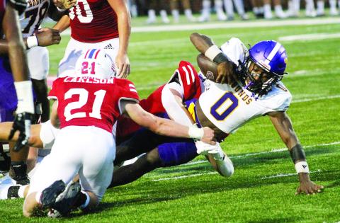 Bruno Hicks fights for extra yardage against the Warhawks. BRAD HARRISON/Staff