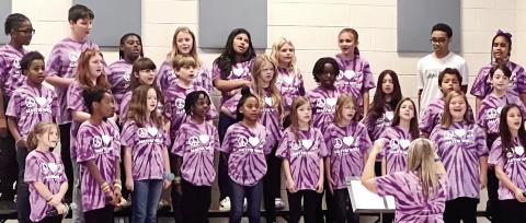 The choir at Mattie Wells Elementary School sang for the veterans during the Veteran’s Day program. ALAINA CLARKE/Staff