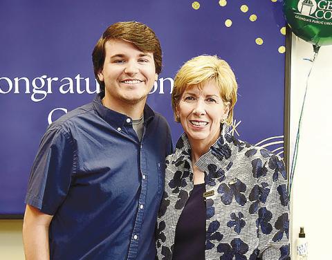 Colin Hall and GCSU President Cathy Cox pose together during a reception informing Hall that he won the Truman Scholarship. CONTRIBUTED