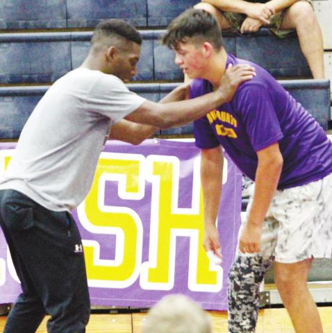 Last week’s camp provided local wrestlers with the opportunity to get oneon-one instruction from Nate Carr Jr. BRAD HARRISON/Staff