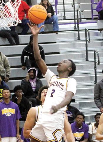 Rudy Bowden coasts in for a layup against the Wildcats. BRAD HARRISON/Staff