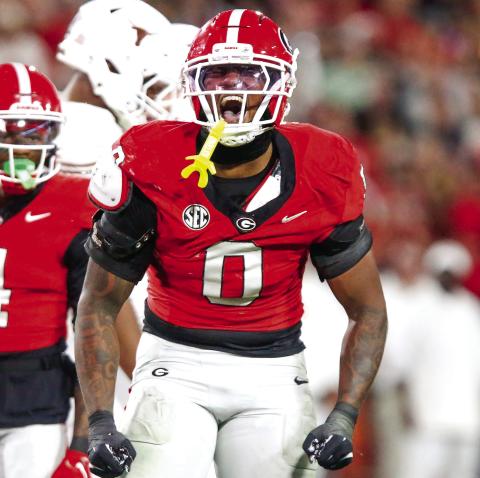 Georgia linebacker Gabe Harris (0) recorded a sack and 1.5 tackles for loss as part of a swarming defense against the Texas Longhorns. LANCE McCURLEY/Staff