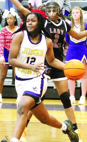 Liberty Pennamon beats the Hornets on the defensive end to push the ball inside. BRAD HARRISON/Staff