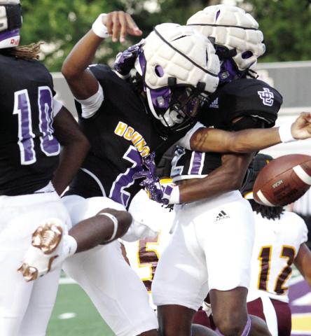 Greyhounds quarterback Devin Edmonds (2) celebrates after JCHS got into the end zone during the first half of Friday’s scrimmage against Perry. BRAD HARRISON/Staff