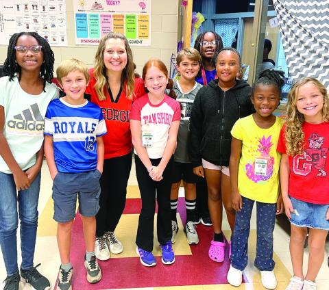 Sneed with students at Gray Elementary. CONTRIBUTED