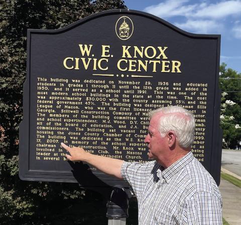 Ethridge pointing out historical marker language. GREENBERRY MOORE/Staff