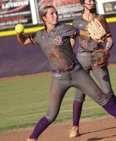 Raylee Harris comes up with a ground ball to make the throw to first base against Union Grove. BRAD HARRISON/Staff