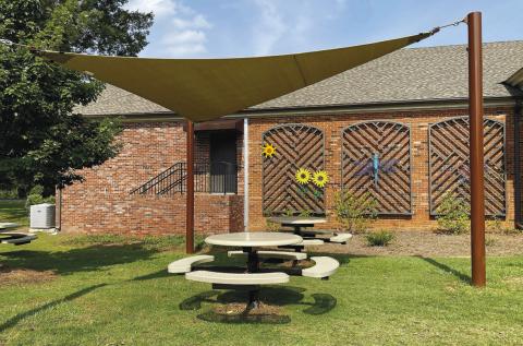 The new benches and shade sails welcome the public to access the internet and enjoy Library Park. DEBBIE LURIE-SMITH/Staff