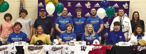 Brody Gordon, Bo Mansfield and Dawson Harris pose after signing their letter of intent to play for Gordon State College. CONTRIBUTED
