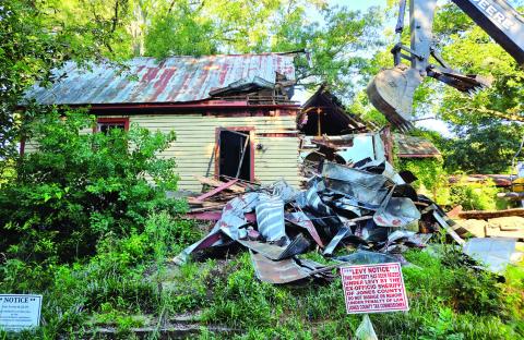 Two properties demolished in blight fight