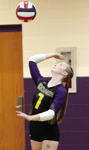 Grace Faircloth serves the ball up and over the net during Tuesday’s win. BRAD HARRISON/Staff