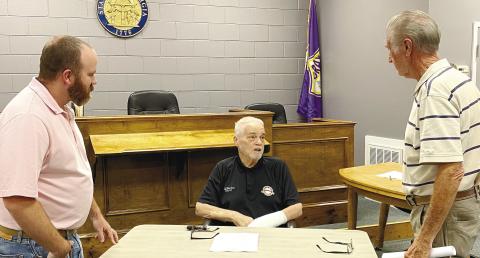 Mayor Ed Barbee (center) speaks with Mayor Pro Tem James Collins (left) and Councilman Terrell Fulford. DEBBIE LURIE-SMITH/Staff