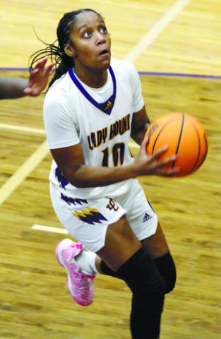 Mya Epps easily makes her way in for a layup on Monday against the Cougars. BRAD HARRISON/Staff