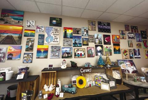 Elliott has painting of various things on her walls for purchase that she says all has meaning. ALAINA CLARKE/STAFF