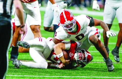 Georgia linebacker Gabe Harris tackles Alabama quarterback Ty Simpson. COURTESY OF UGA ATHLETICS