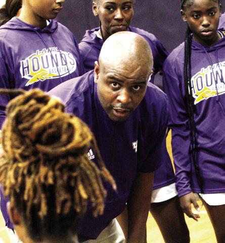 Greyhounds head coach Takeo Gray lays out strategy during a preseason scrimmage against Houston County. BRAD HARRISON/Staff