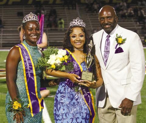 Laila Dennis (center) was crowned 2023 Jones County High School Homecoming Queen by 2022 Queen Aniya Canty before Friday night’s football game. Also pictured is JCHS principal Dennis Woolfolk. 