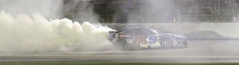Chase Elliott celebrates Saturday night’s win at EchoPark Speedway with a burnout. BRAD HARRISON/Staff