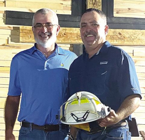 Fire chief becomes official; firefighters honored