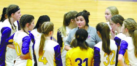 Lady Hounds ninth grade coach Harlie Sharp gives her team instructions during a timeout last week against Houston County. BRAD HARRISON/Staff